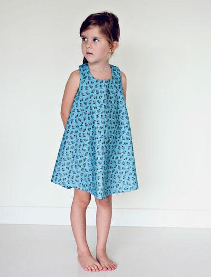 Little Girl in Blue Patterned Dress