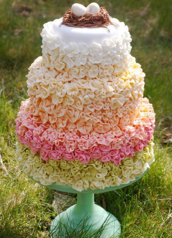 Multicolored Tiered Pastel Ruffle Cake Topped with Birds Nest