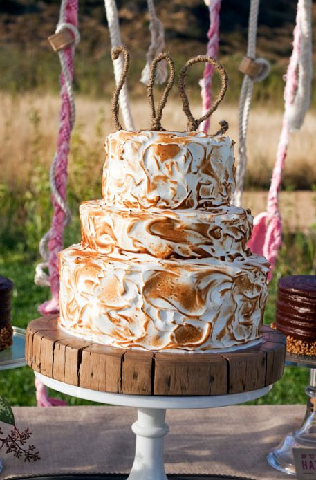 Tiered Toasted Meringue Covered Wedding Cake with Decorative Topper