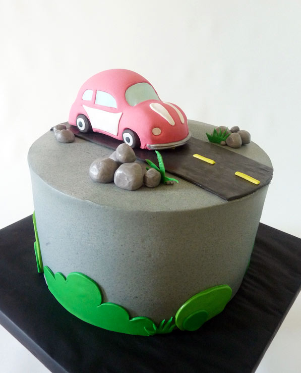 Cake Featuring Little Red VW Bug on Road