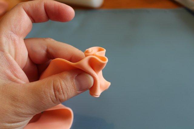 Hand Adding Ruffled Texture to Fondant Rose