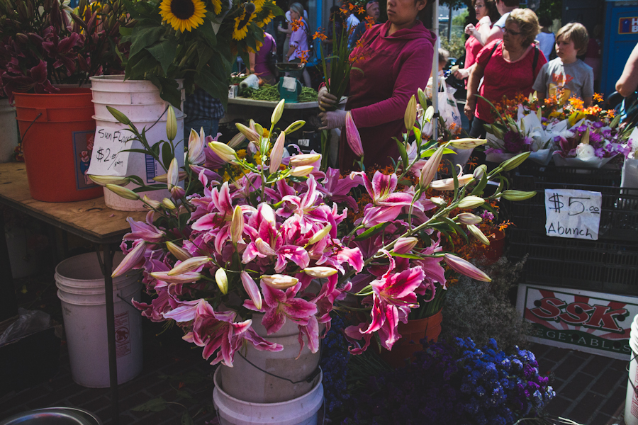 Bunches of Flowers in Buckets for Sale at Farmers Market