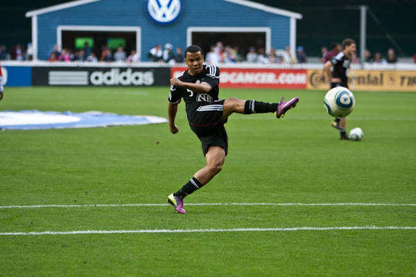 Soccer Player Kicking a Ball