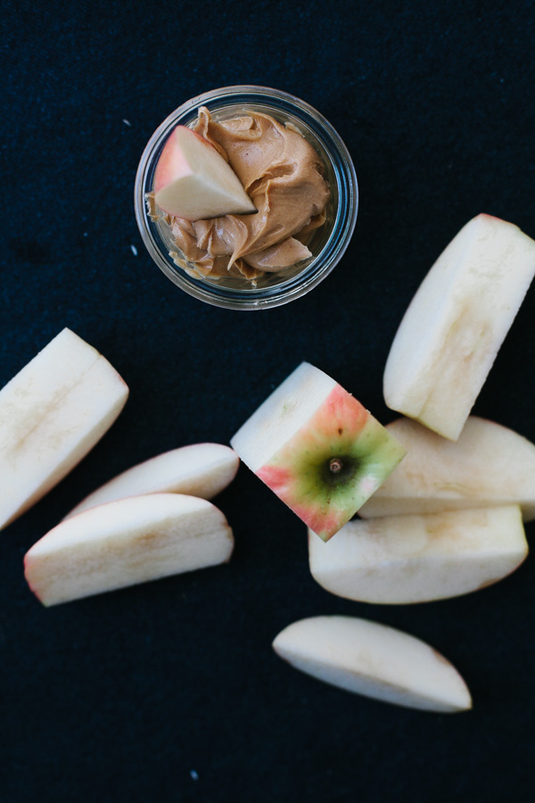 Bowl of Peanut Butter and Slices of Apples