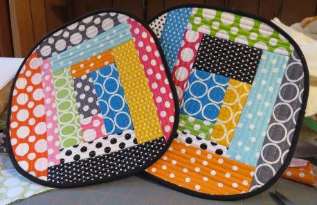 Two Colorfully Patterned Quilted Hot Pads