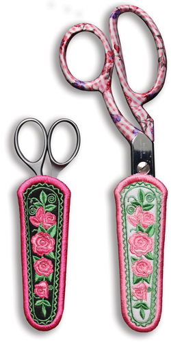 Pairs of Small and Large Scissors in Embroidered Scissor Holders