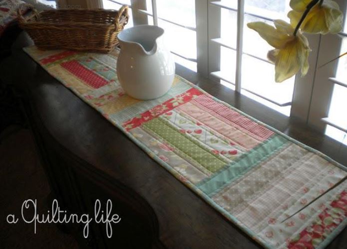 Quilted Table Runner Next to Window, Pitcher on Top