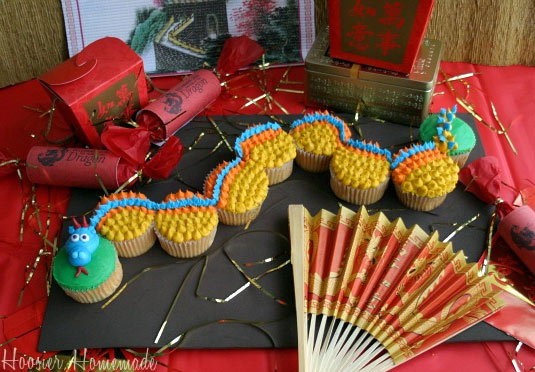 Cupcakes in Shape of Dragon, City Next to Asian Party Favors