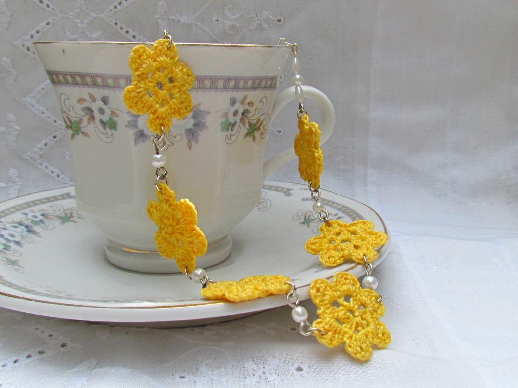 Necklace Featuring Crochet Detail, Laying in Teacup