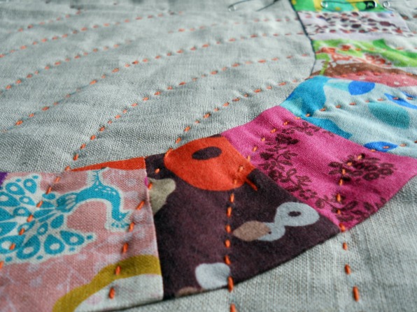 Quilt with Colorful Patterning and Hand Stitching