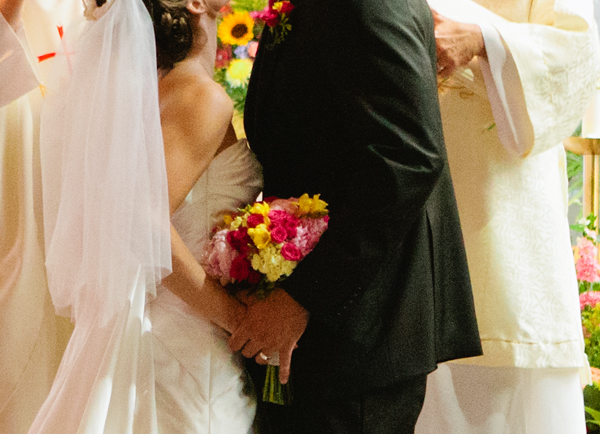 Color Detail Photo of Wedding Couple at Alter