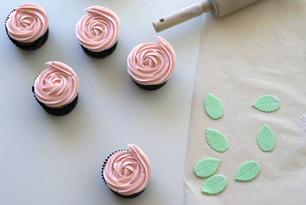 3 Iced Pink Cupcakes, Green Fondant Leaves, Wax Paper