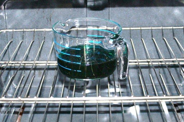 Sugar in Measuring Cup Sitting in Stove