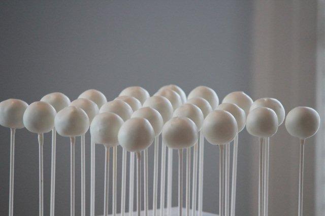 Smoothly Dipped Cake Pops in a Cake Pop Holder
