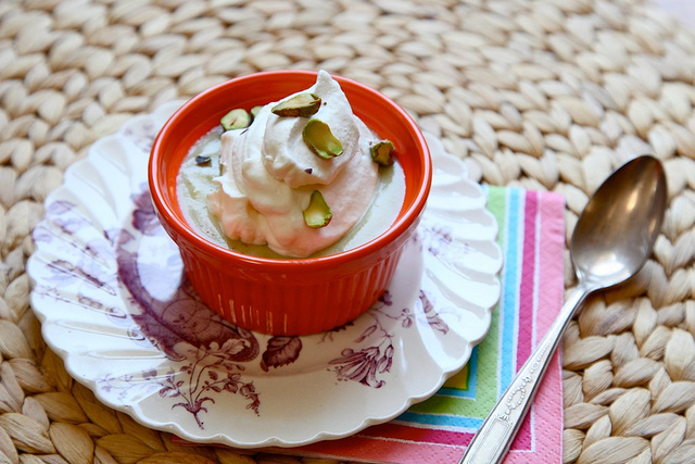 Pistachio Pudding in a Little Red Bowl, Topped with Whipped Cream and Pistachios