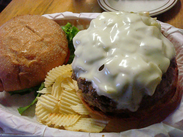 Burger Topped with Chile Cheese, Side of Potato Chips