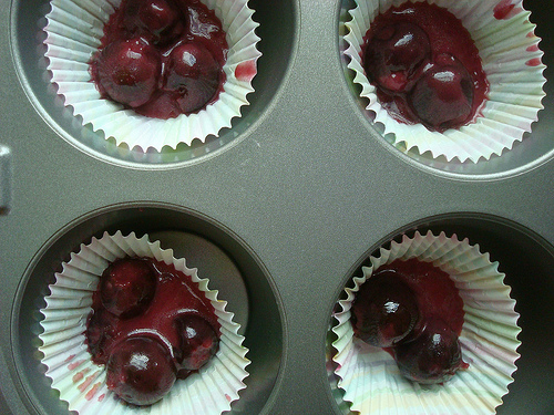 Cherries in Cupcake Wrappers in Muffin Tin 