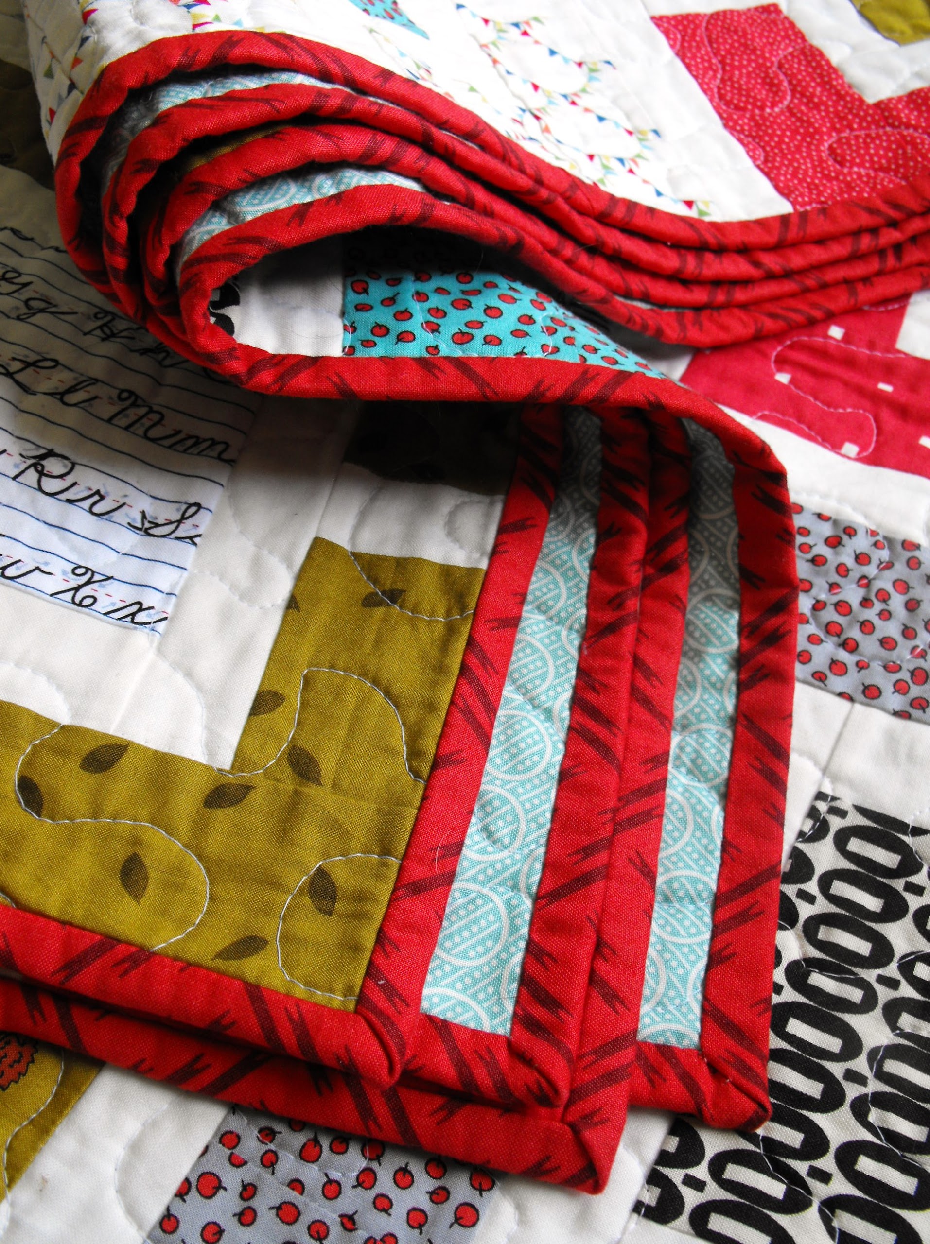 Red Bordered Quilt Folded 