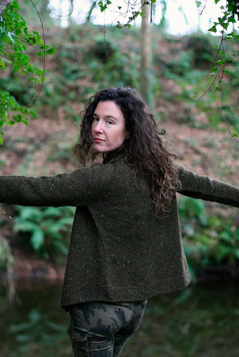 Carol Feller Modeling Brown Sweater