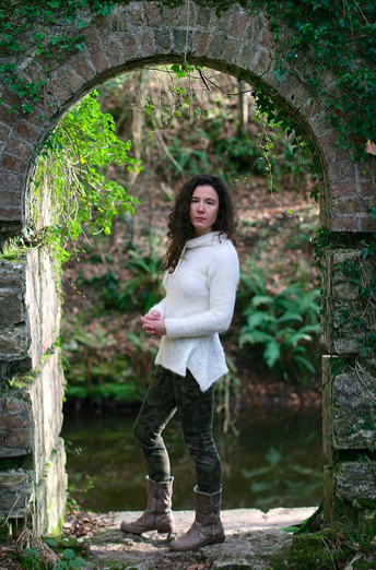 Carol Feller in Stone Archway Modeling White Sweater