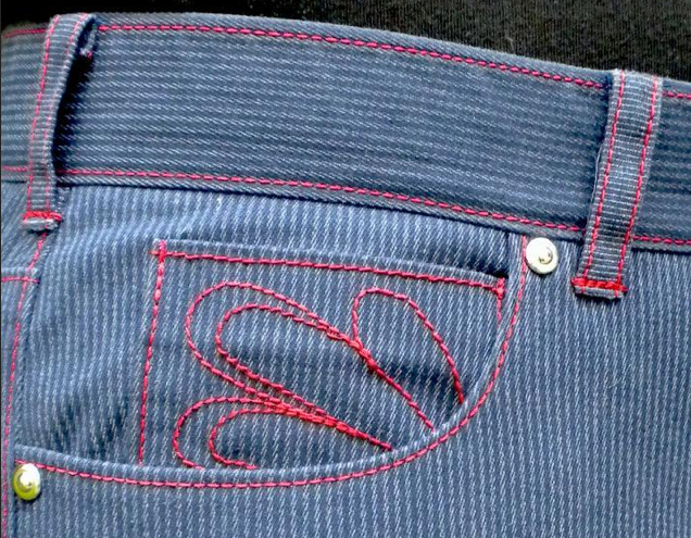 Close Up on Belt Loops of Blue Pants with Red Trim