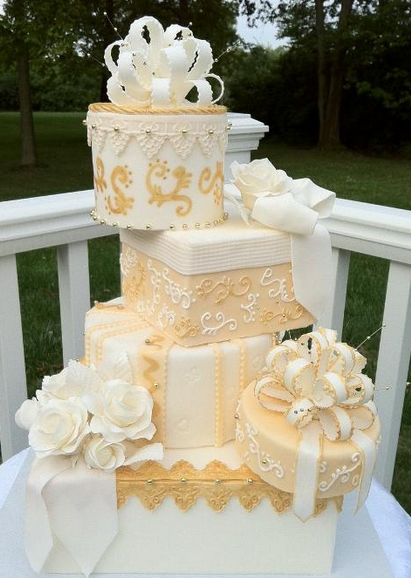 Tiered White and Gold Wedding Cake 