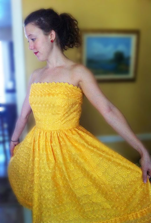 Girl Modeling Yellow Dress with Straight Tapered Dart