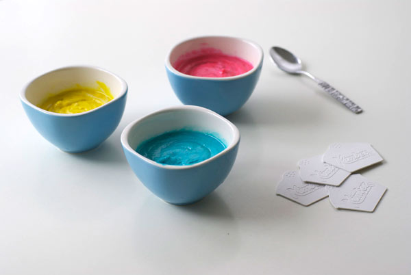 Three Bowls with Blue, Yellow and Pink Batter