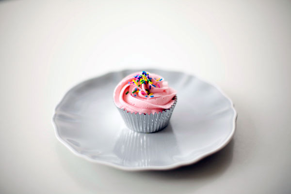 Cupcake with Pink Icing and Sprinkles