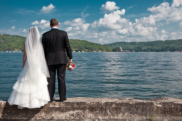 Image of Bride and Groom Looking Out Over Lake 