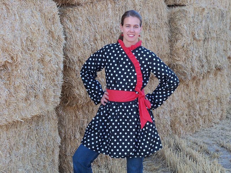 Woman Modeling Polka Dot Jacked with Red Sash