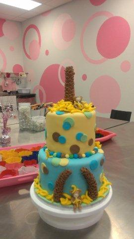 Tiered Cake with Palm Tree Trunk on Top