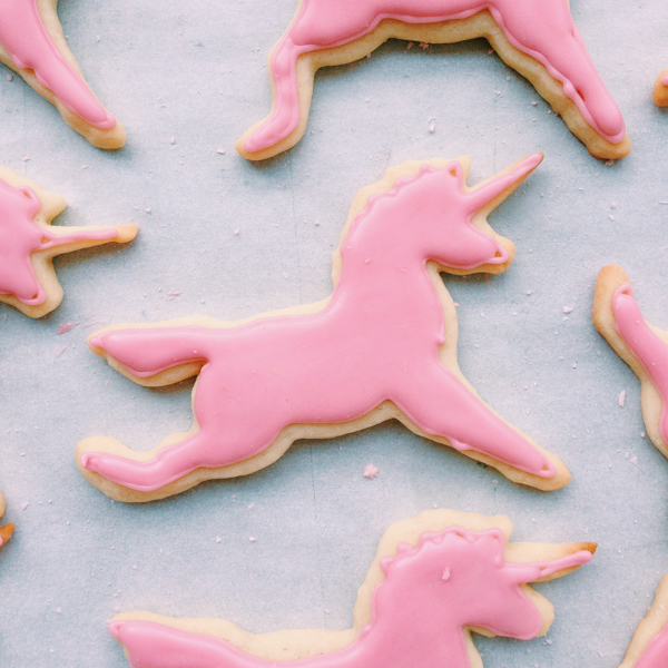 Unicorn-Shaped Sugar Cookies with Pink Icing 
