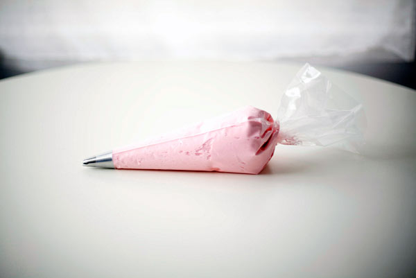 Pink Icing in Piping Bag