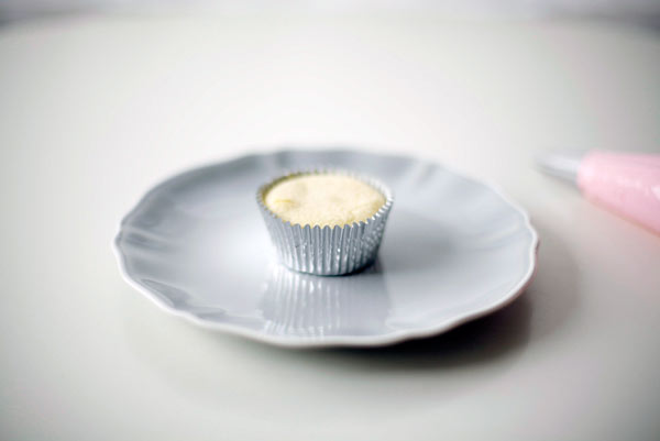 Un-Iced Cupcake on Silver Plate