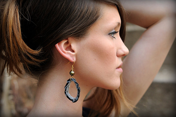 Profile of Woman Holding Her Hair Up