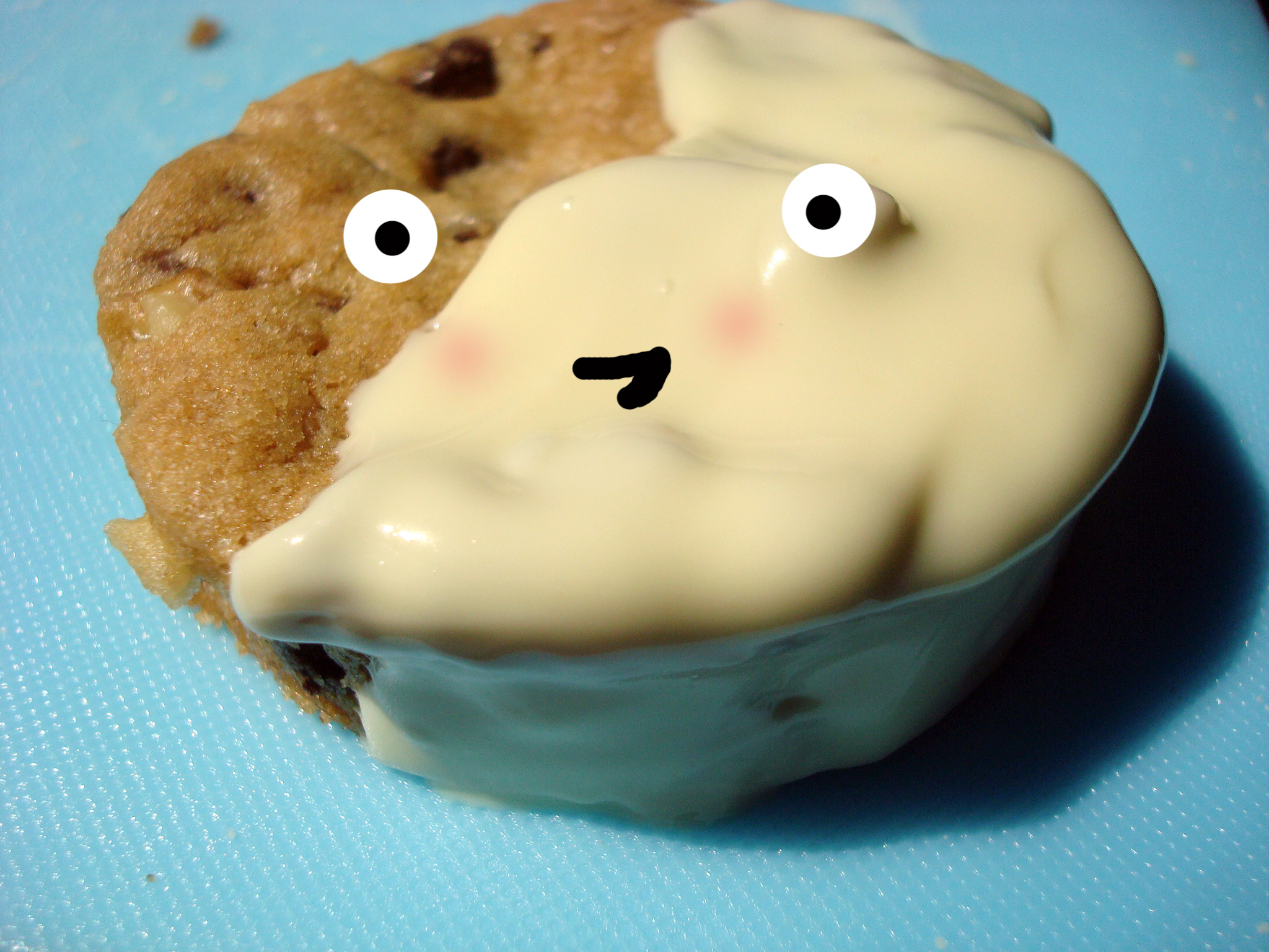 Chocolate Chip Cookie Covered in White Chocolate with Cartoon Face