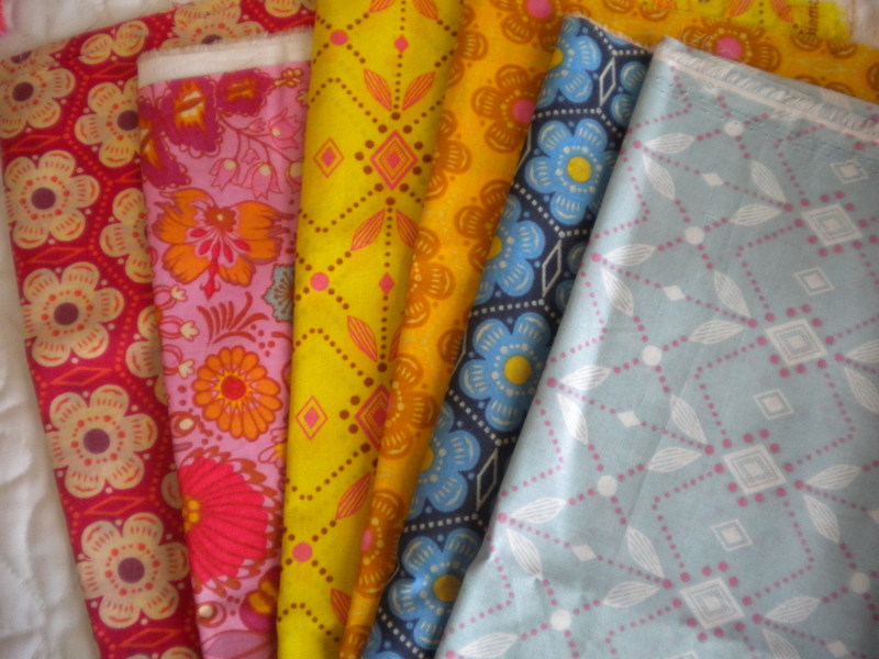 Row of Brightly Patterned Fabric