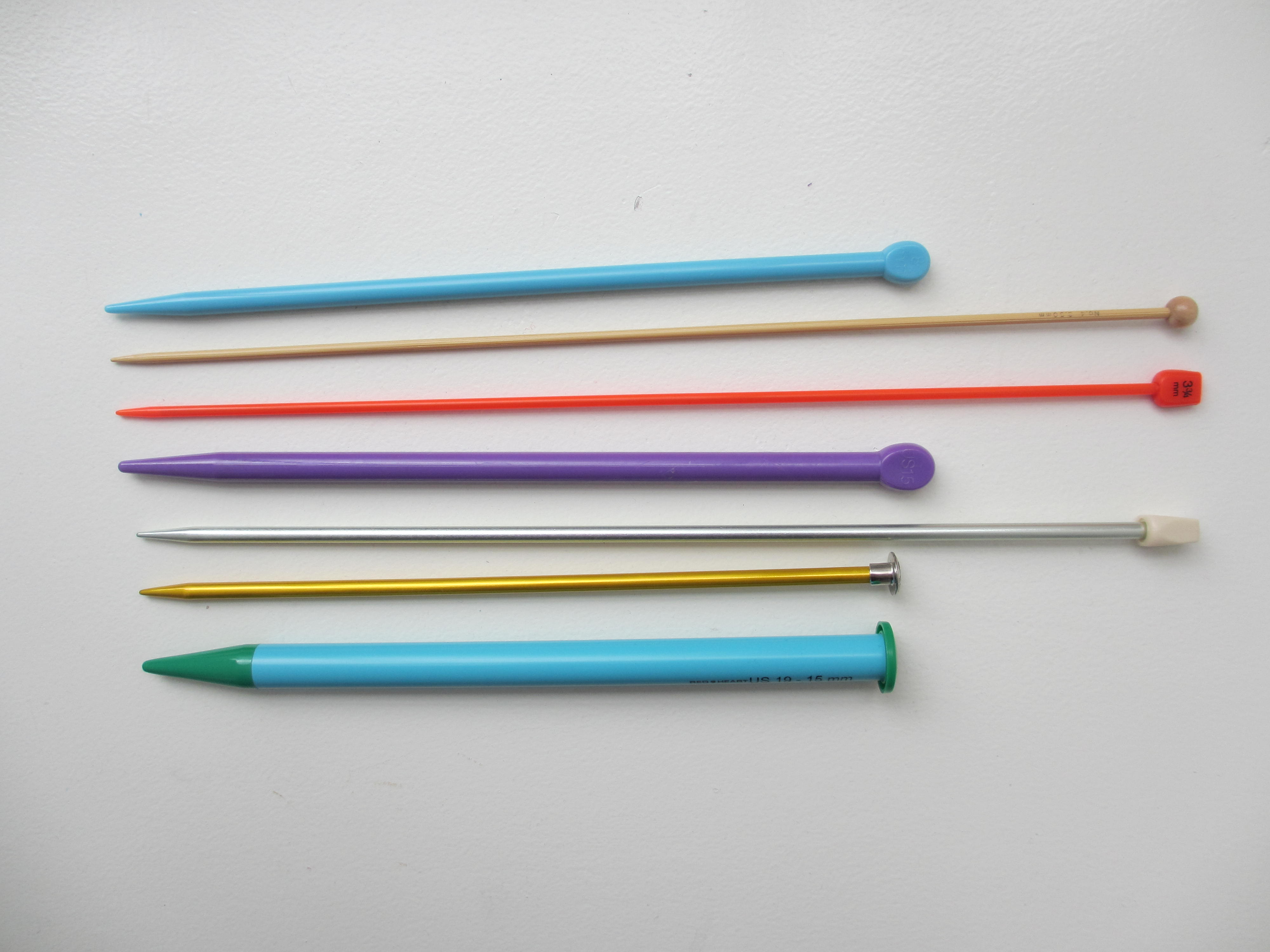 Various Colored Knitting Needles