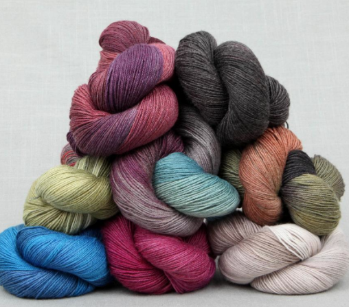 Stack of Lorna Lace Soulmate Yarn 