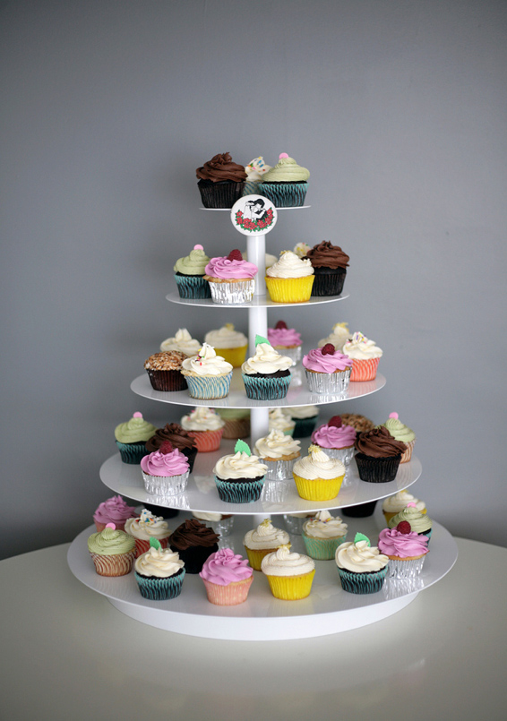 Cupcakes on White Tiered Tower