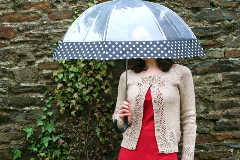 Akoya Cardigan, Modeled by Woman with Umbrella