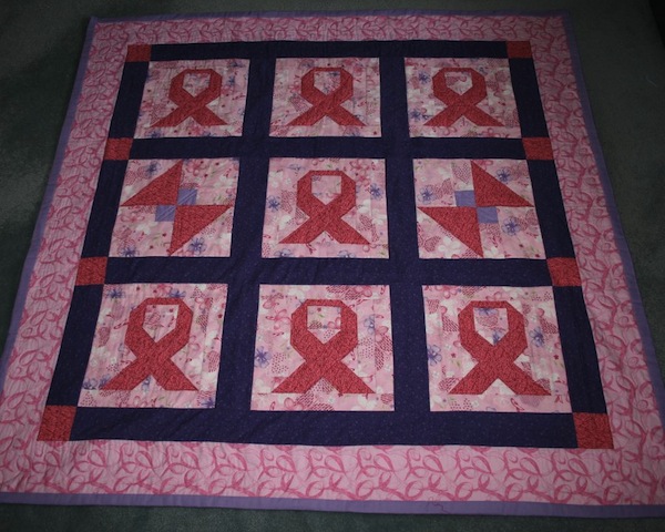 Quilt Featuring Patchwork Pink Ribbons