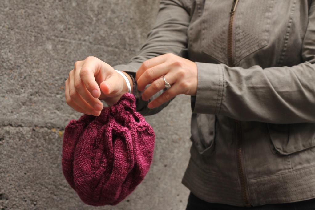 Woman with Pink Knit Satchel, a Quick Knitting Project 