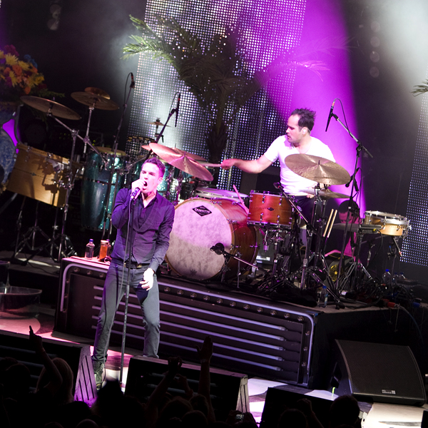 Band Performing on Colorful Stage