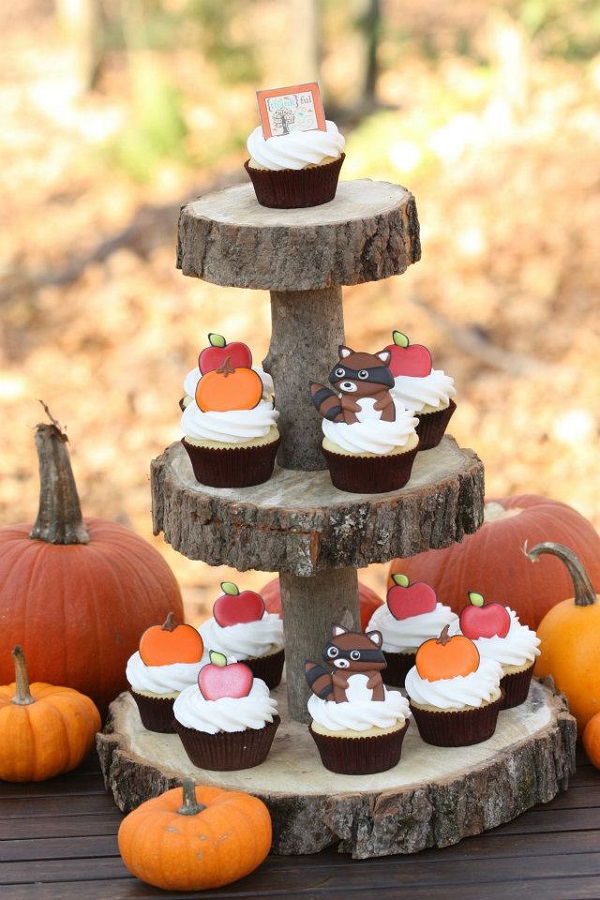Fall Cupcakes with Fall Themed Toppers on Wood Tower