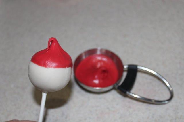 Dipping Cake Pop in Candy Melts