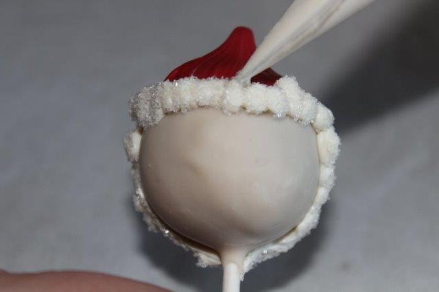 Piping the Puffs of the Santa Hat