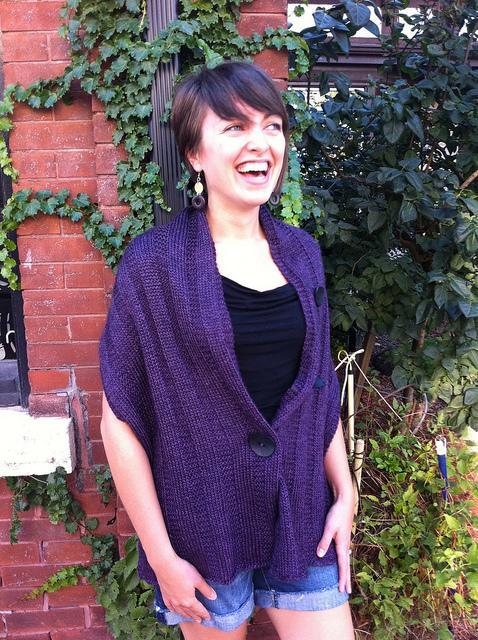 Knitted wrap with button