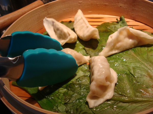 Removing Dumplings from Steamer